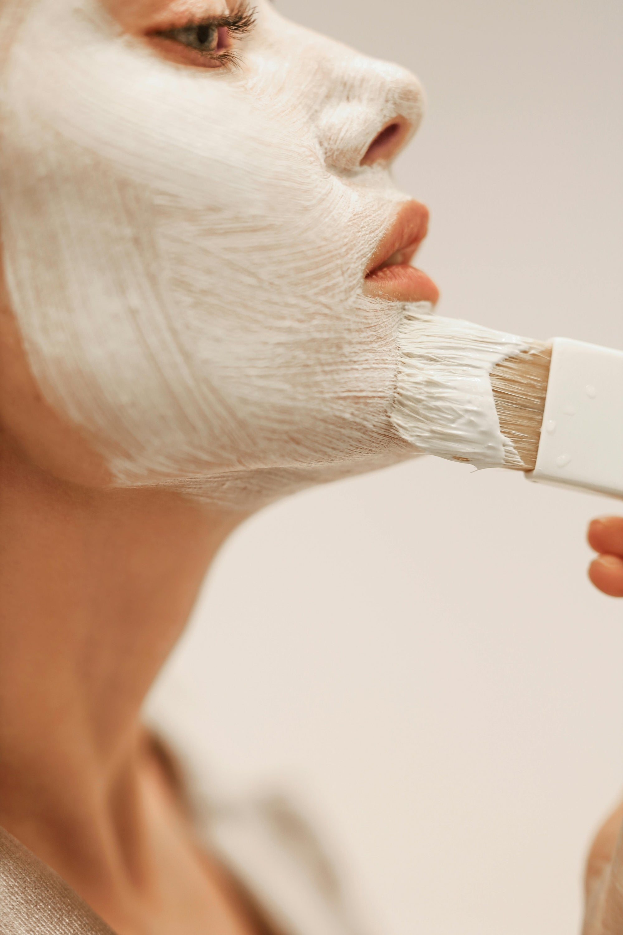 close up pic of someone applyling a beauty mask to represent in the this med spa great barrington, ma